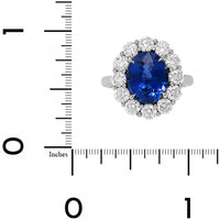 Platinum Oval Blue Sapphire and Diamond Halo Ring