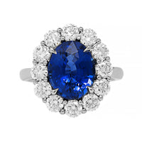 Platinum Oval Blue Sapphire and Diamond Halo Ring