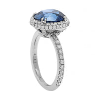 Platinum Oval Blue Sapphire and Diamond Halo Ring