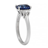 Platinum Three Stone Emerald Cut Sapphire and Cadillac Diamond Ring