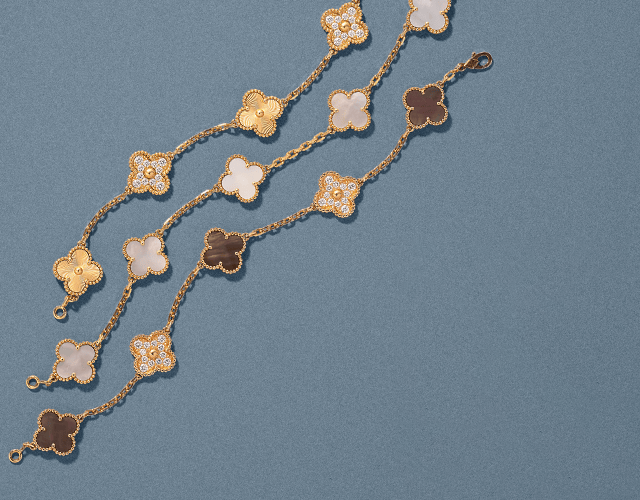 Van Cleef & Arpels Bracelets Pre-Owned Fine Jewelry on blue background