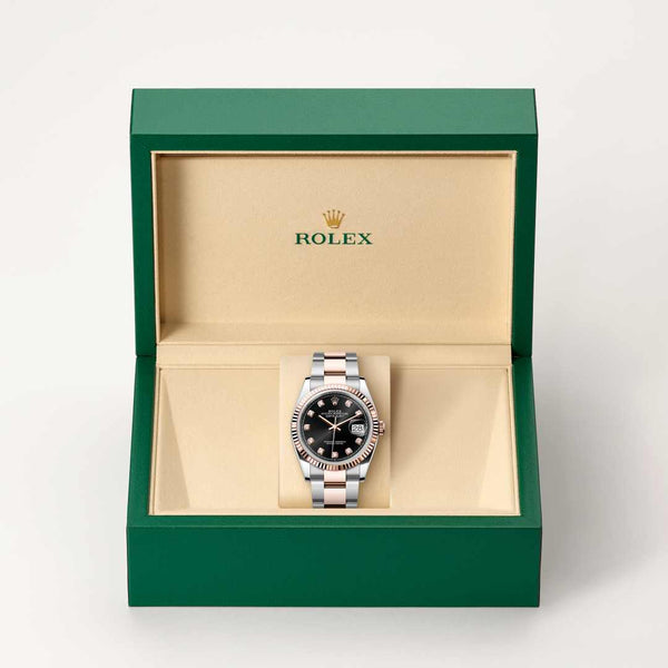 Rolex Datejust watch in box