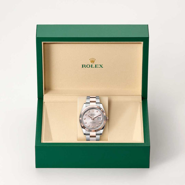 Rolex Datejust watch in box