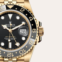Dial closeup of a Rolex GMT-Master II watch