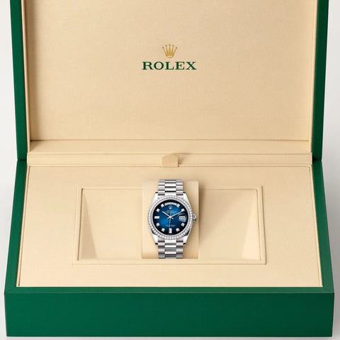 Rolex Day-Date watch in box