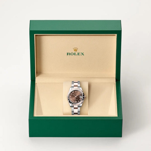 Rolex Datejust watch in box