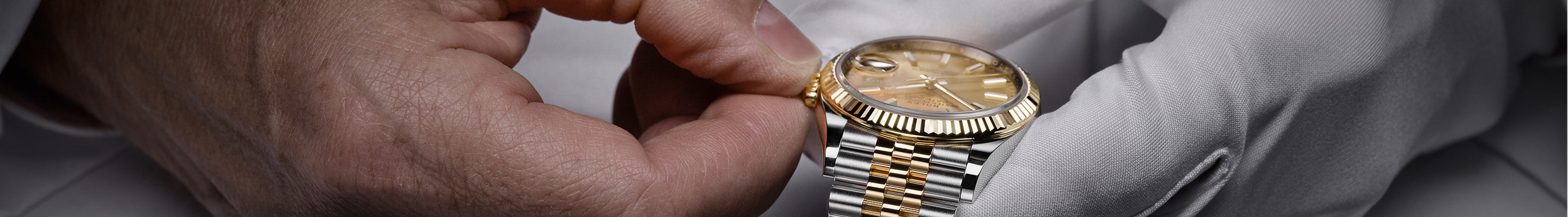 Winding a Rolex steel and gold watch