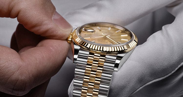 Winding a Rolex steel and gold watch