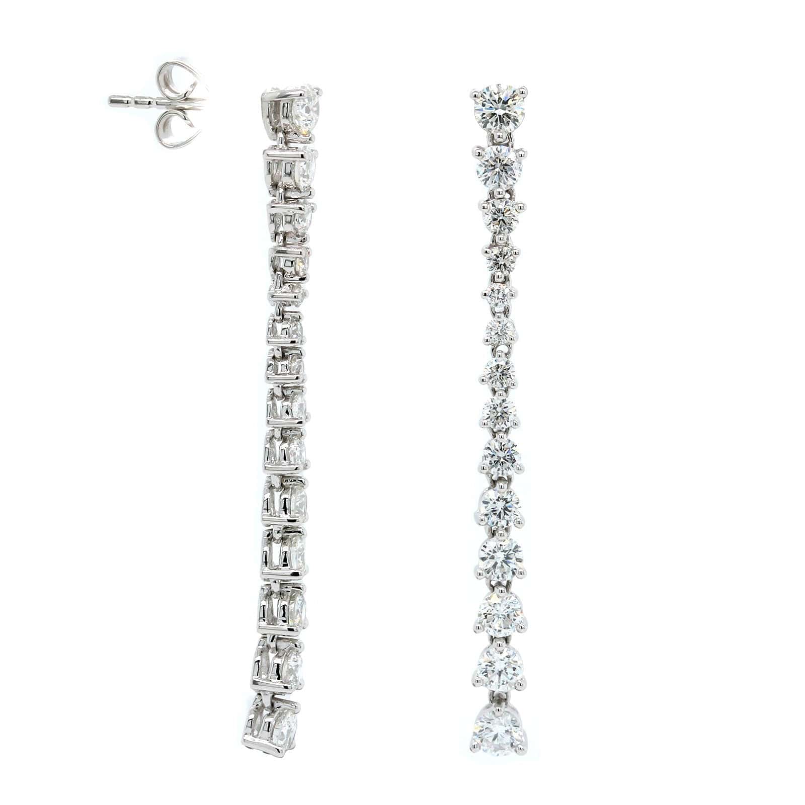 https://cdn.shopify.com/s/files/1/0301/8121/files/14K-White-Gold-Graduated-Diamond-Drop-Earrings-White_Gold-front-DFE5669_a238fb6f-9ba8-4c82-9b06-fcce3e32fa07.jpg?v=1635646179