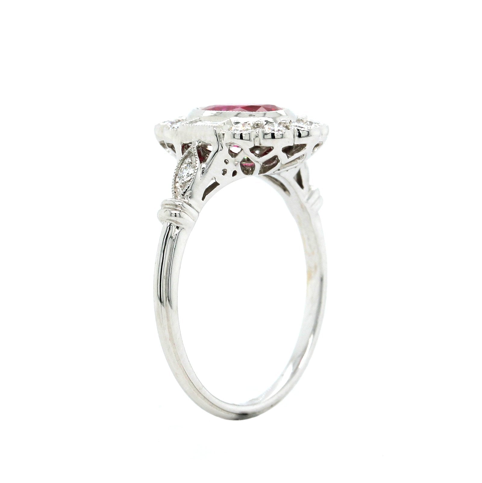 18K White Gold Oval Ruby with Round and Baguette Diamond Halo Ring