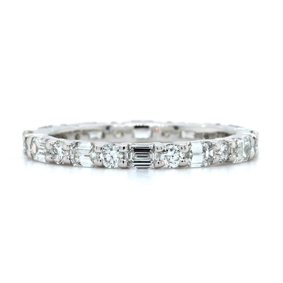 Platinum Emerald and Round Cut Diamond Eternity Band