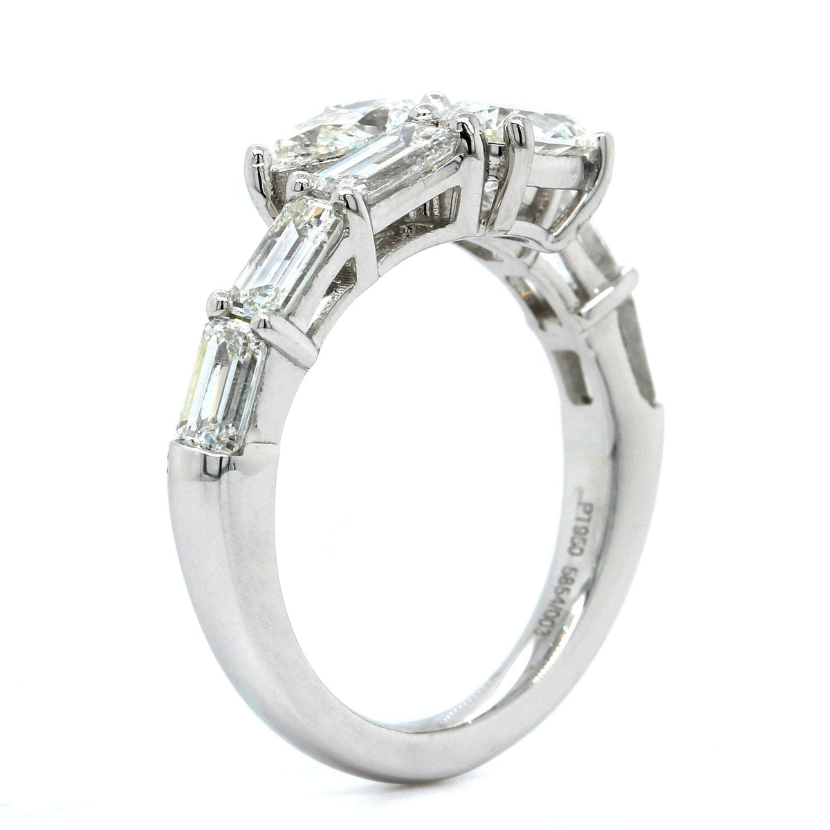 Platinum Bypass Pear Shape Diamond Ring