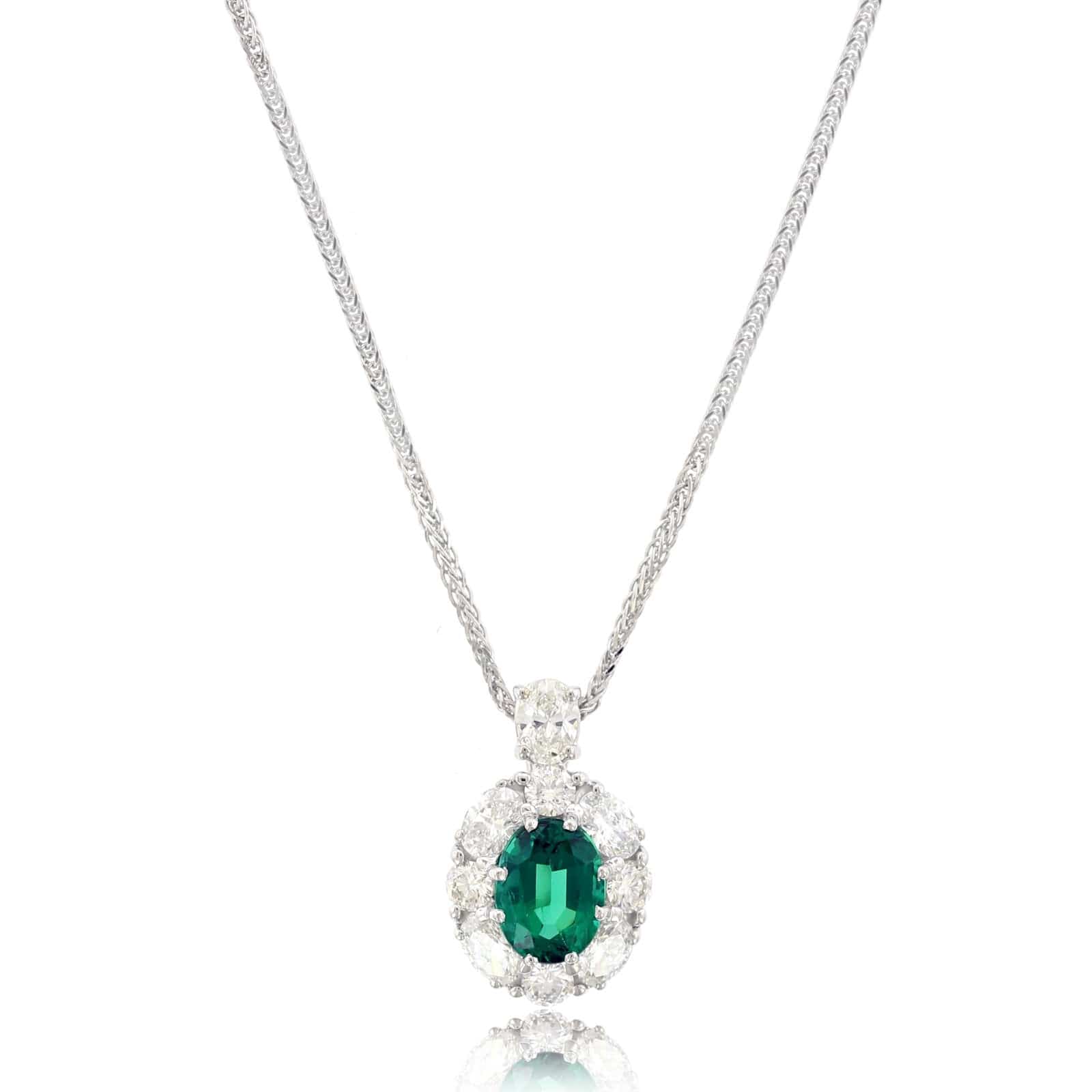 Platinum Oval Emerald and Diamond Halo Pendant