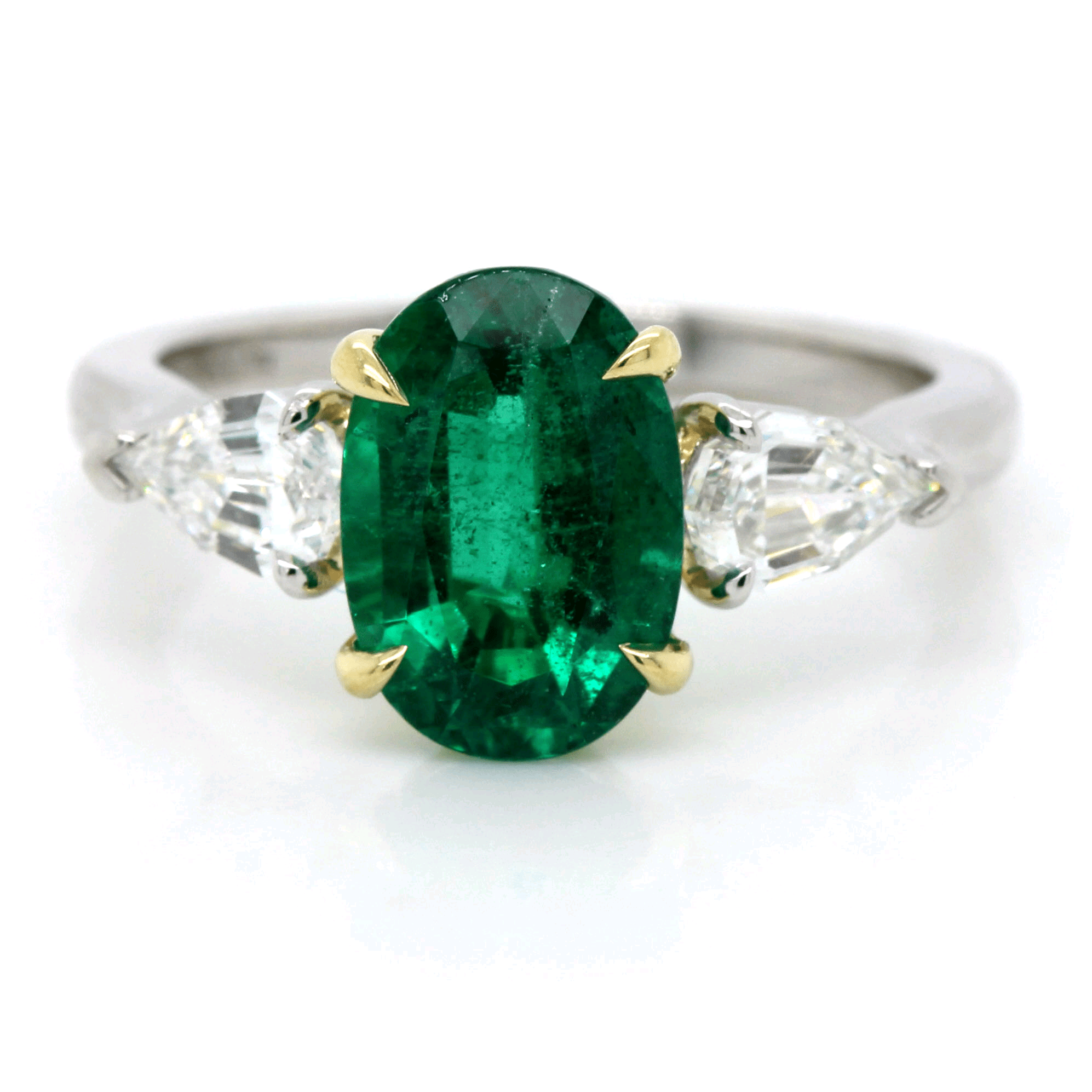 Platinum Oval Emerald and Diamond Ring