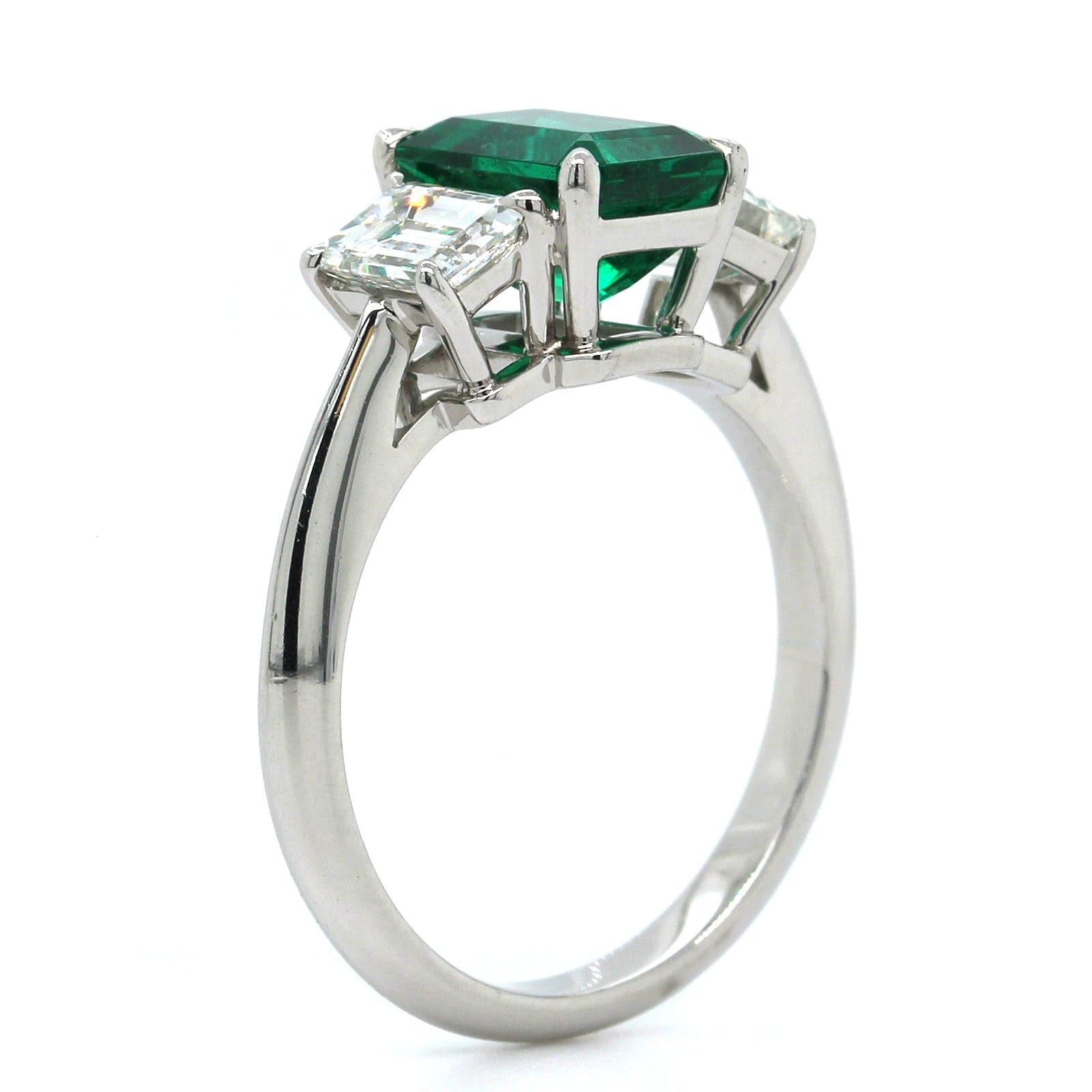 Platinum Emerald Cut Emerald and Diamond 3 Stone Ring