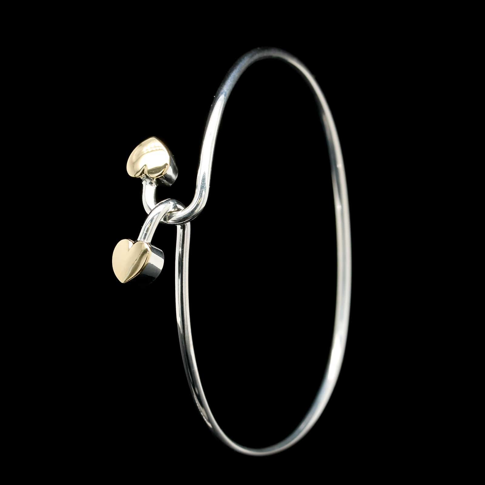 Tiffany & Co Sterling Silver and 18K Yellow Gold Estate Heart Hook Bangle Bracelet, Sterling silver and 18k yellow gold, Long's Jewelers