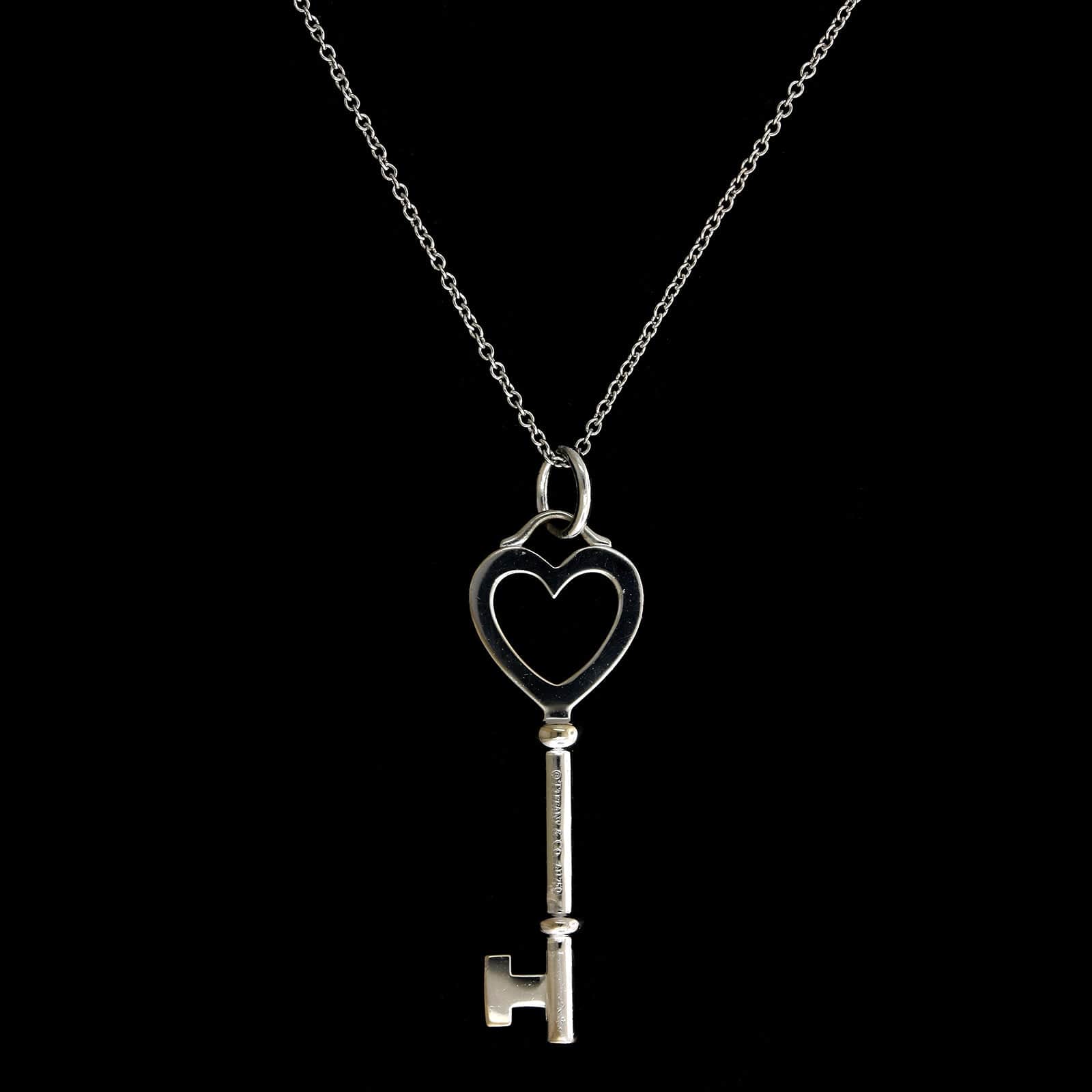 Tiffany & Co. 18K White Gold Estate Diamond Heart Key Pendant