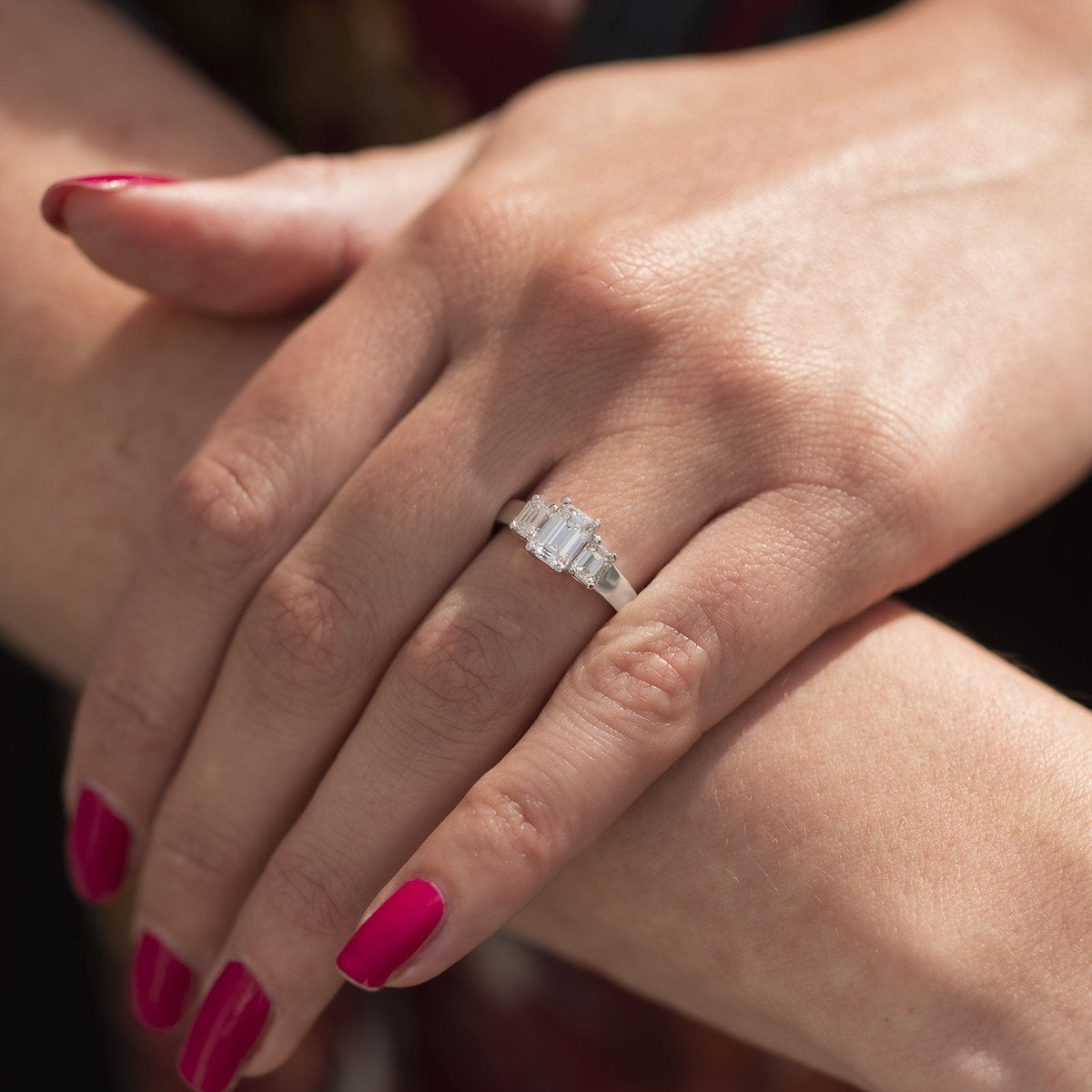 Platinum 3 Stone Emerald Cut Diamond Engagement Ring