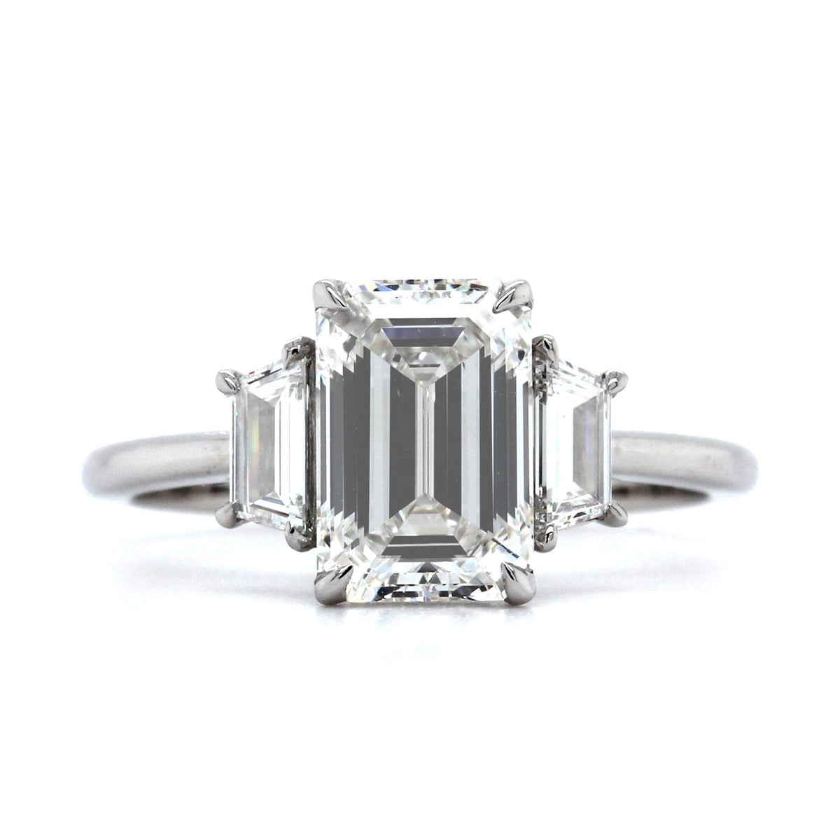 Platinum Three-Stone Emerald Engagement Ring
