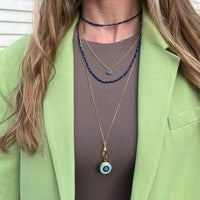 18K Yellow Gold Bezel Set Pear Shaped Blue Sapphire Pendant