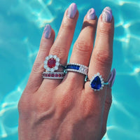 Platinum and 18K Yellow Gold Oval Ruby with Diamond Halo Ring