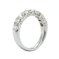 Platinum Emerald and Round Cut Diamond Band