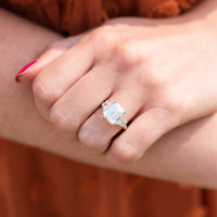 Platinum 3 Stone Emerald Cut Diamond with Trapezoid Sides Engagement Ring Setting