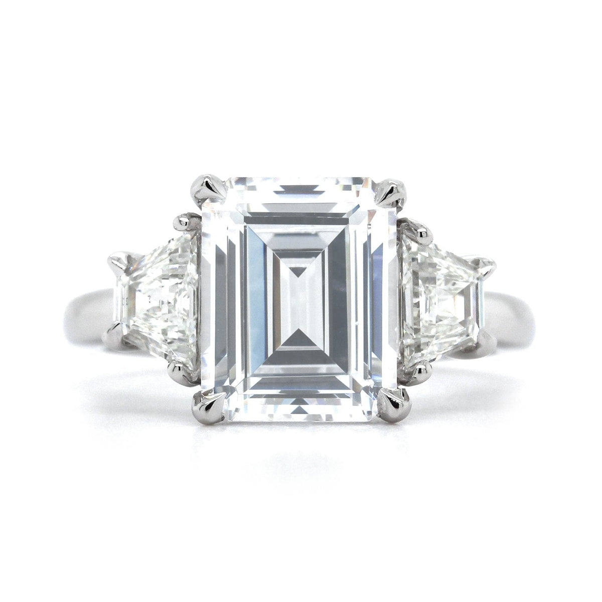 Platinum 3 Stone Emerald Cut Diamond with Trapezoid Sides Engagement Ring Setting