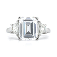 Platinum 3 Stone Emerald Cut Diamond with Trapezoid Sides Engagement Ring Setting