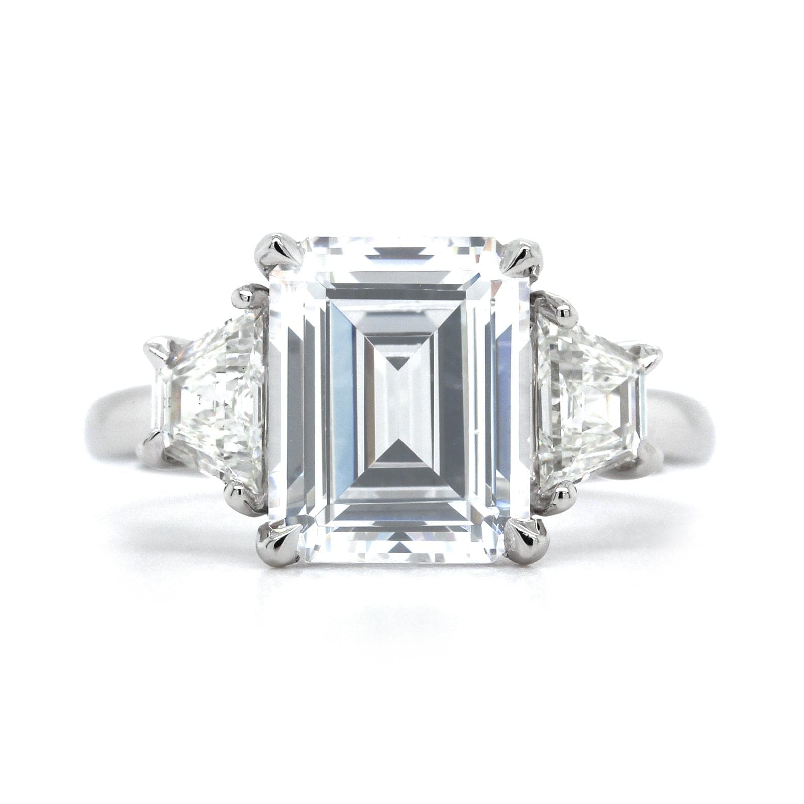 Platinum 3 Stone Emerald Cut Diamond with Trapezoid Sides Engagement Ring Setting