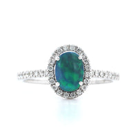 18K White Gold Oval Black Opal and Diamond Halo Ring