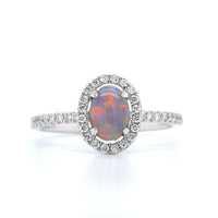18K White Gold Oval Black Opal and Diamond Halo Ring