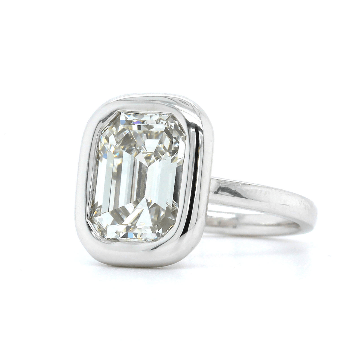 Platinum Emerald Cut Diamond Bezel Set Engagement Ring
