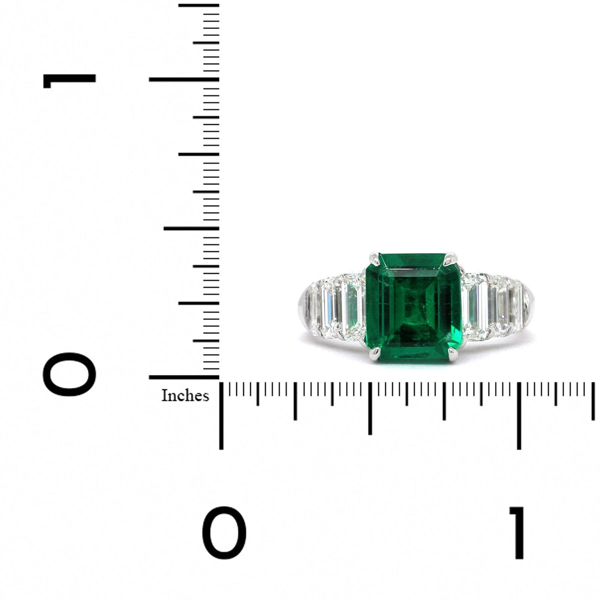 Platinum Emerald Ring with Emerald Cut Diamond Sides