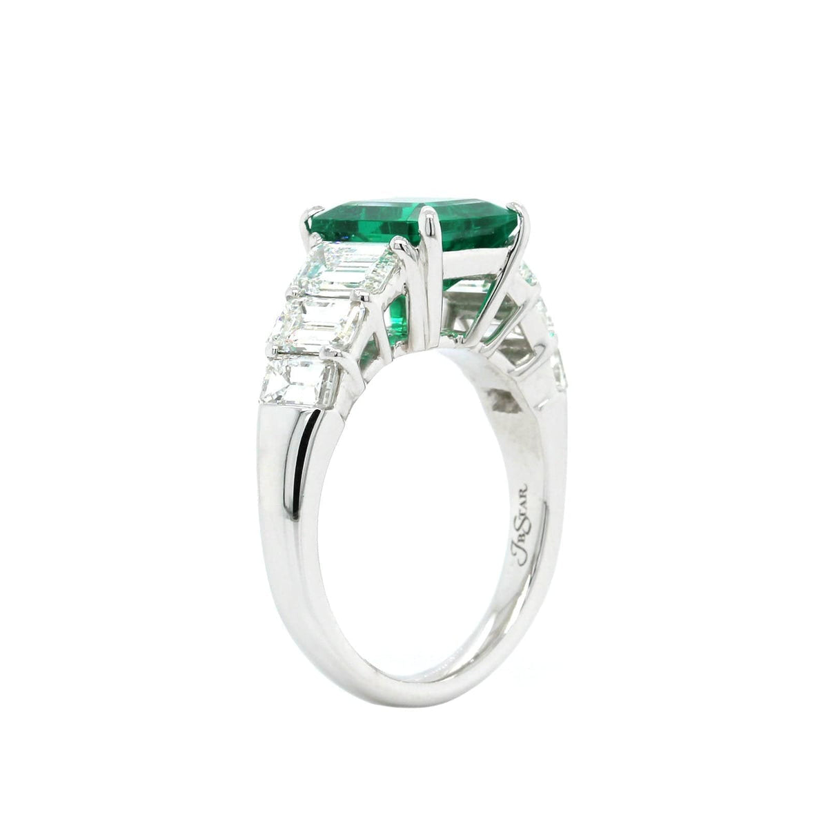 Platinum Emerald Ring with Emerald Cut Diamond Sides