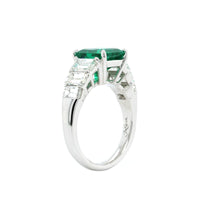 Platinum Emerald Ring with Emerald Cut Diamond Sides