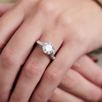 Platinum Round Diamond with Baguette Sides Engagement Ring