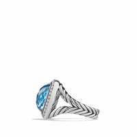 Ring with Blue Topaz and Diamonds