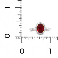 Platinum and 18K Yellow Gold Oval Ruby with Diamond Halo Ring