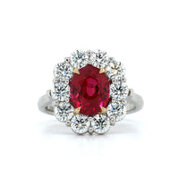 Platinum and 18K Yellow Gold Oval Ruby with Diamond Halo Ring