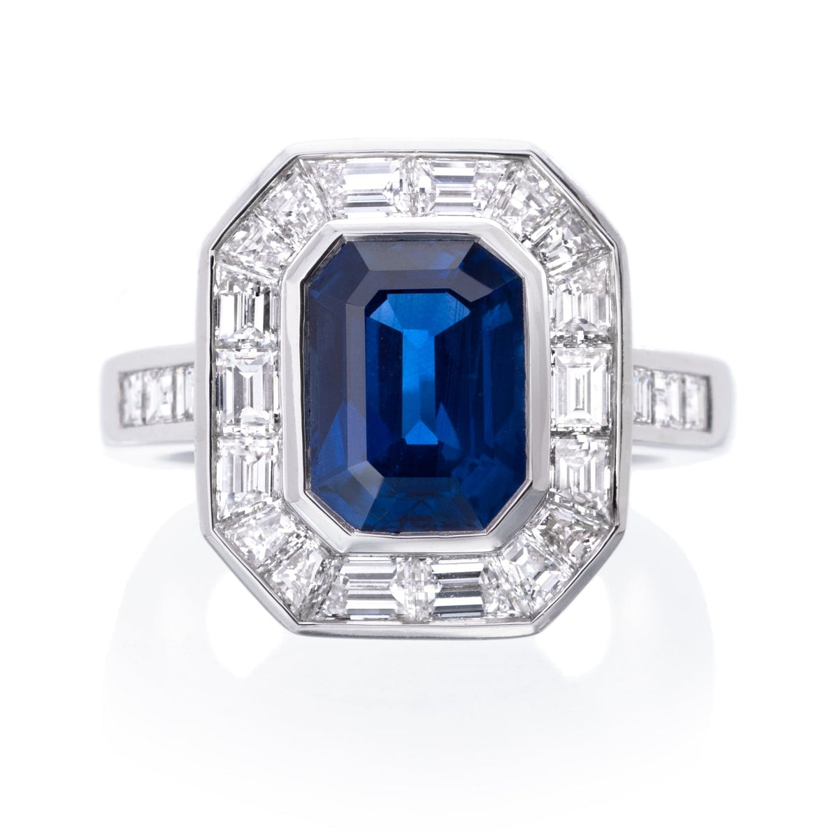 Platinum Emerald Cut Sapphire Halo Diamond Ring