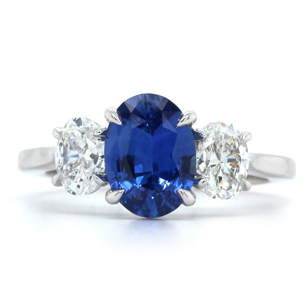 Platinum Three Stone Sapphire and Diamond Ring