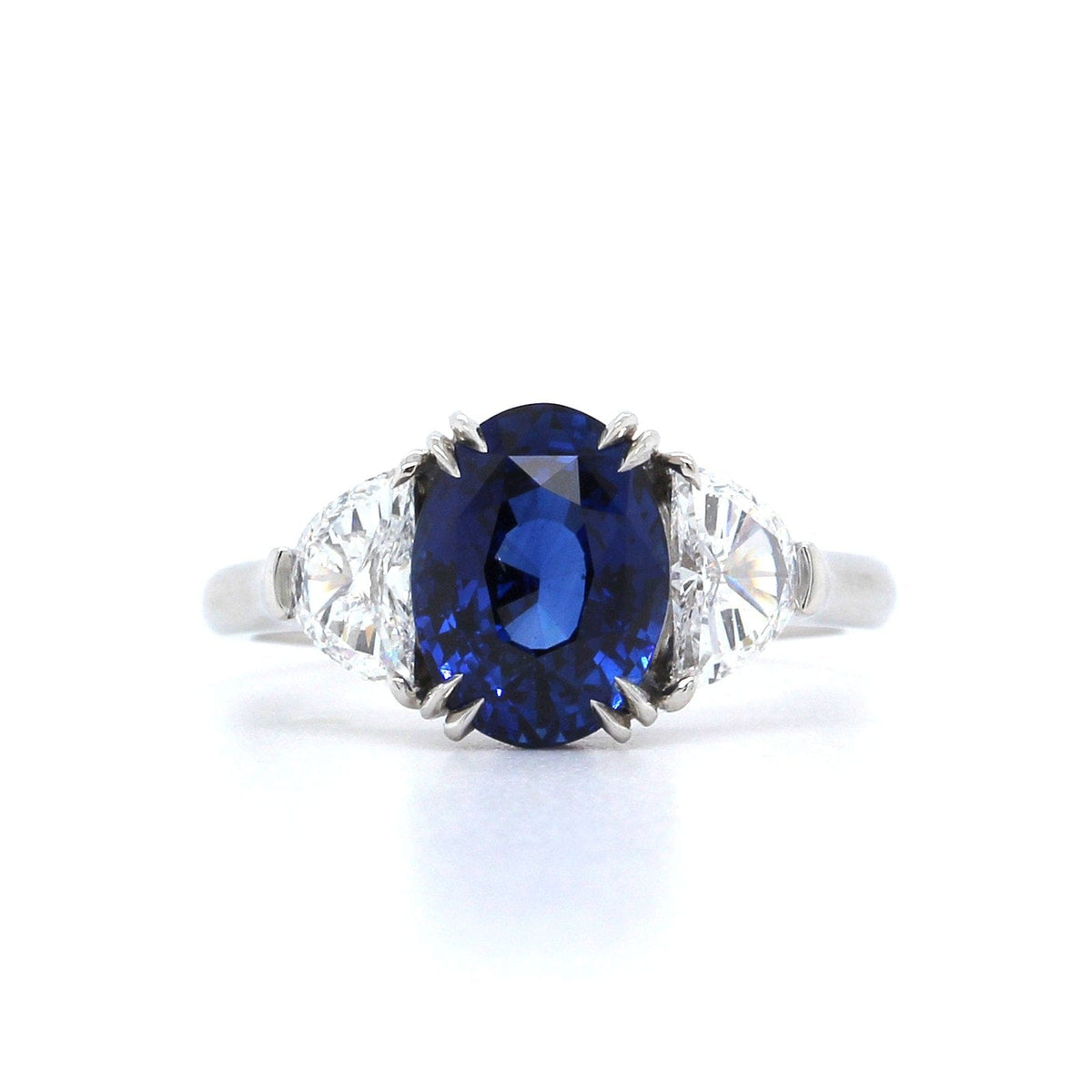 Platinum Oval Sapphire and Half Moon Diamond Ring