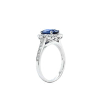 18K White Gold Sapphire and Diamond Halo Ring