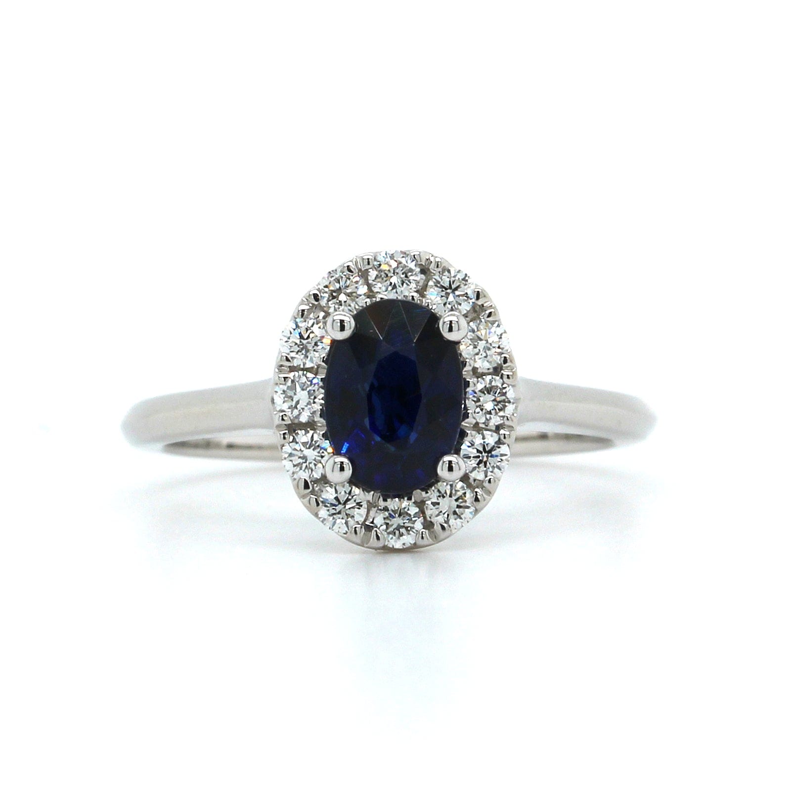 18K White Gold Oval Sapphire and Diamond Halo Ring
