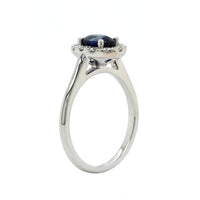 18K White Gold Oval Sapphire and Diamond Halo Ring