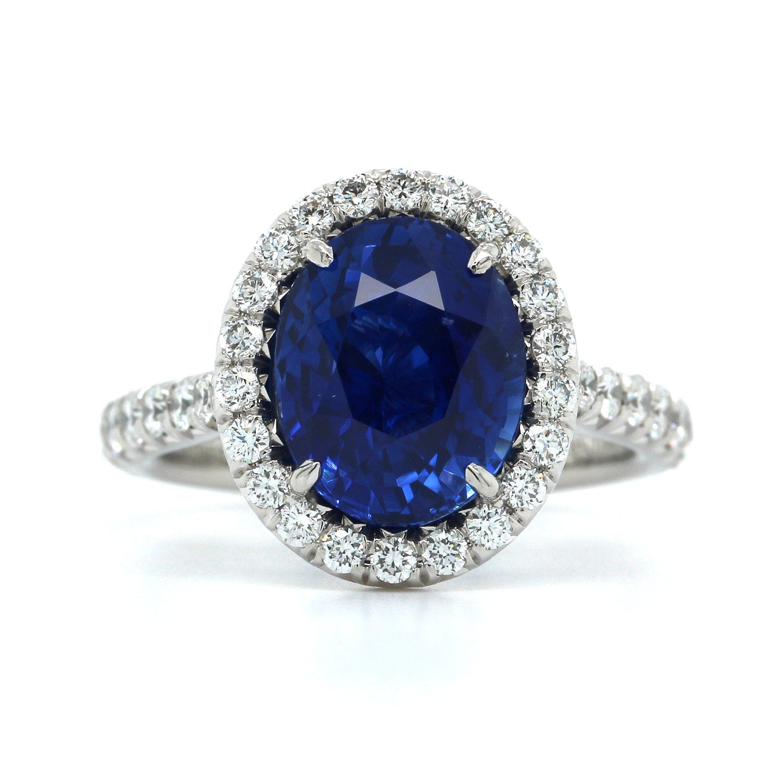 Platinum Oval Sapphire Diamond Halo Ring
