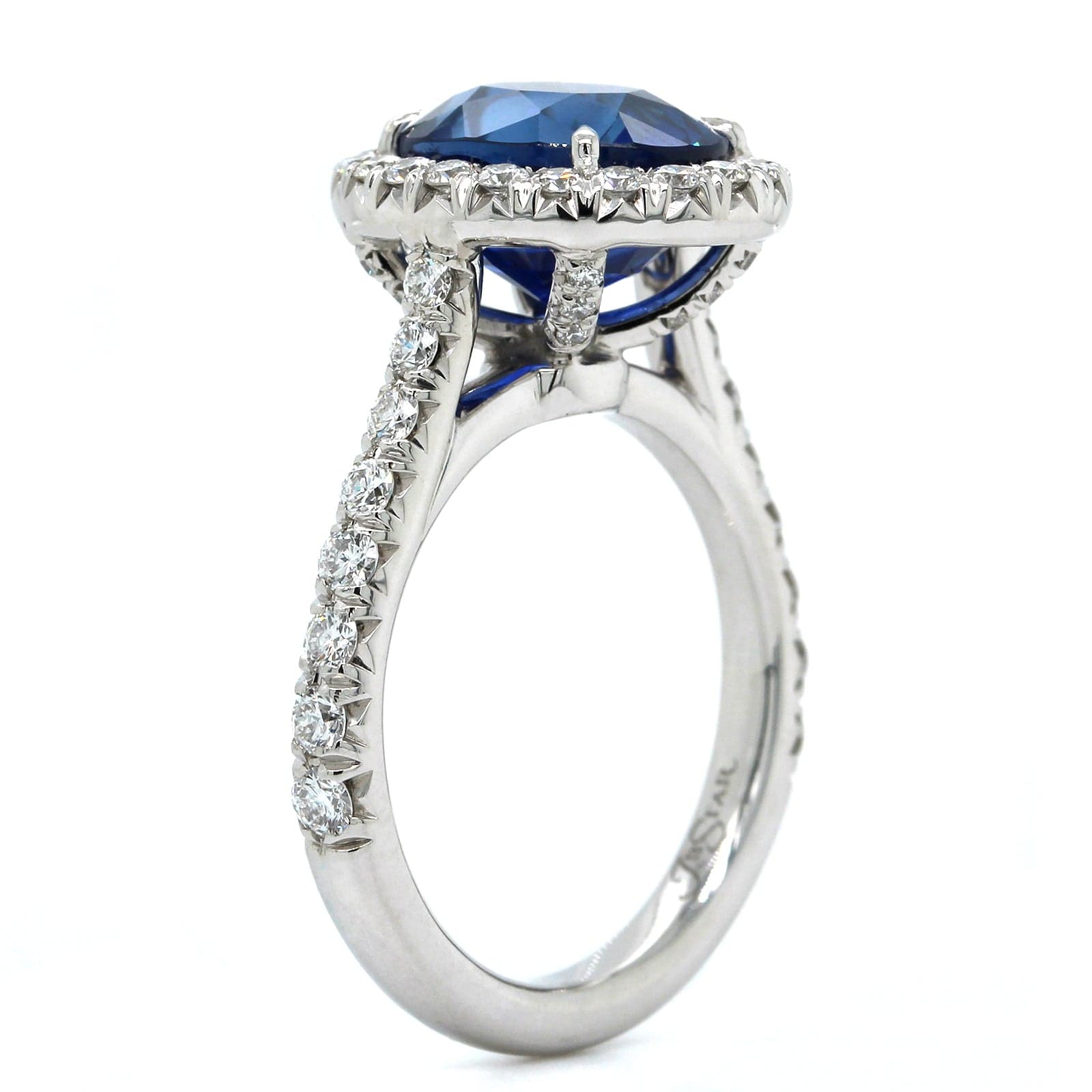 Platinum Oval Sapphire Diamond Halo Ring