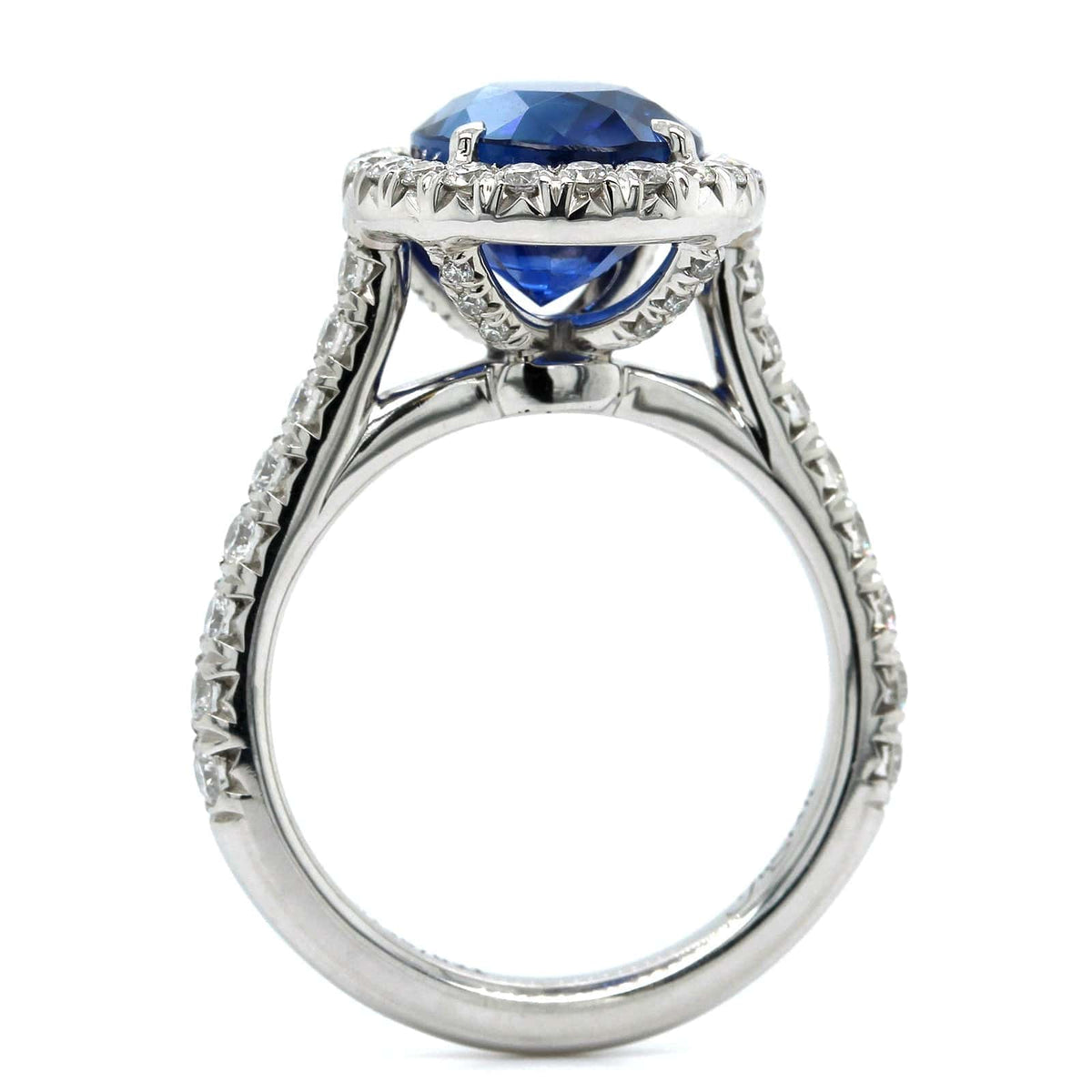 Platinum Oval Sapphire Diamond Halo Ring