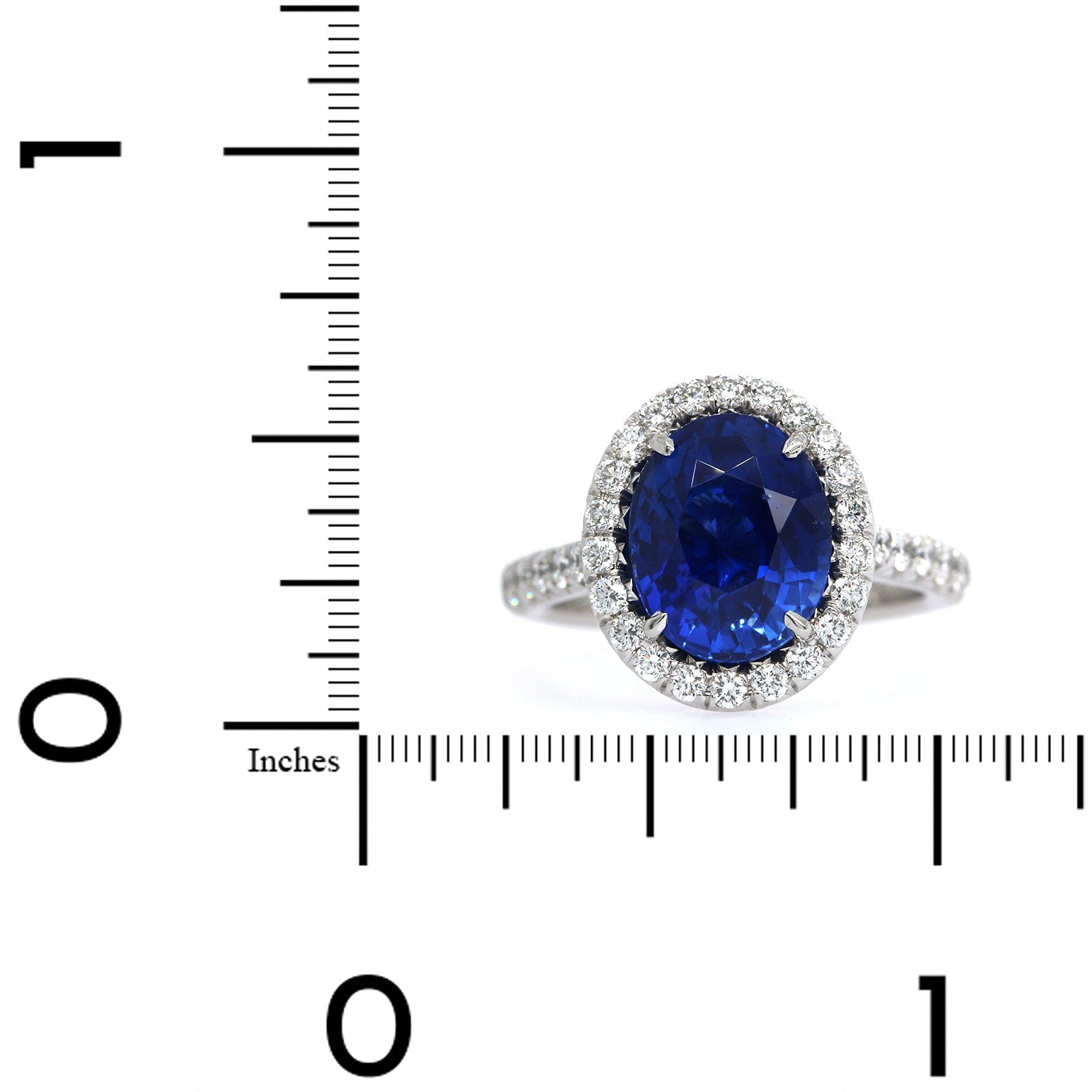 Platinum Oval Sapphire Diamond Halo Ring